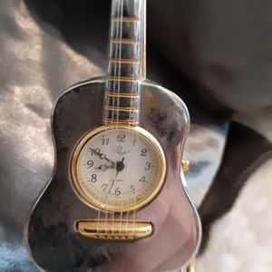 Vintage antique silver color guitar clock